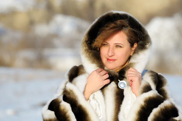 The woman in a mink fur coat — Stock Photo, Image
