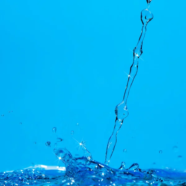 Spatten en water golven — Stockfoto