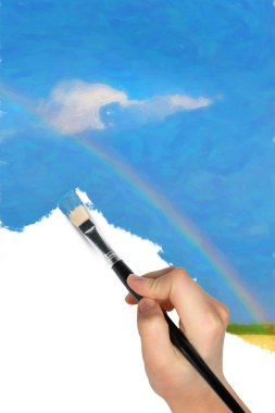 The hand with a brush draws a landscape clipart