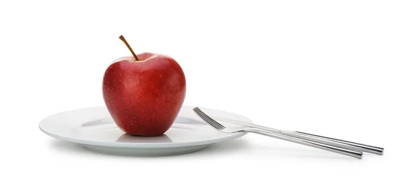 Manzana roja en plato — Foto de Stock
