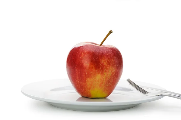Plaka üzerinde kırmızı elma — Stok fotoğraf