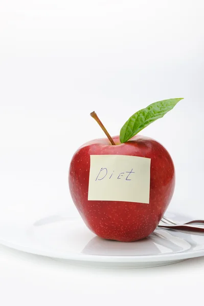 Pomme avec une note papier — Photo
