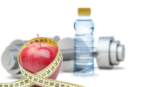 Dumbbells with an apple and measuring type — Stock Photo, Image