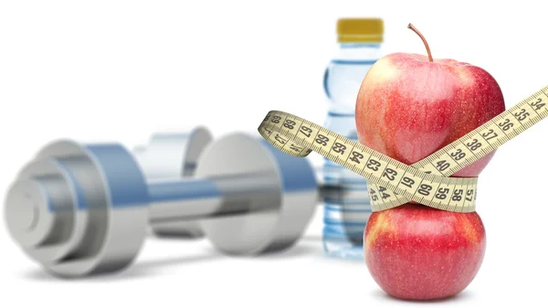 Halteres com uma maçã e tipo de medição — Fotografia de Stock