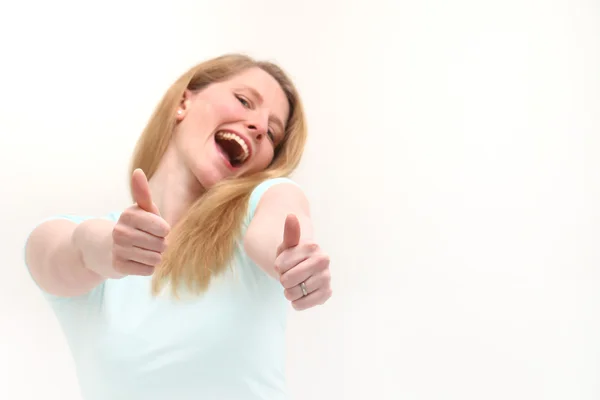 Mujer entusiasta dando pulgares hacia arriba —  Fotos de Stock