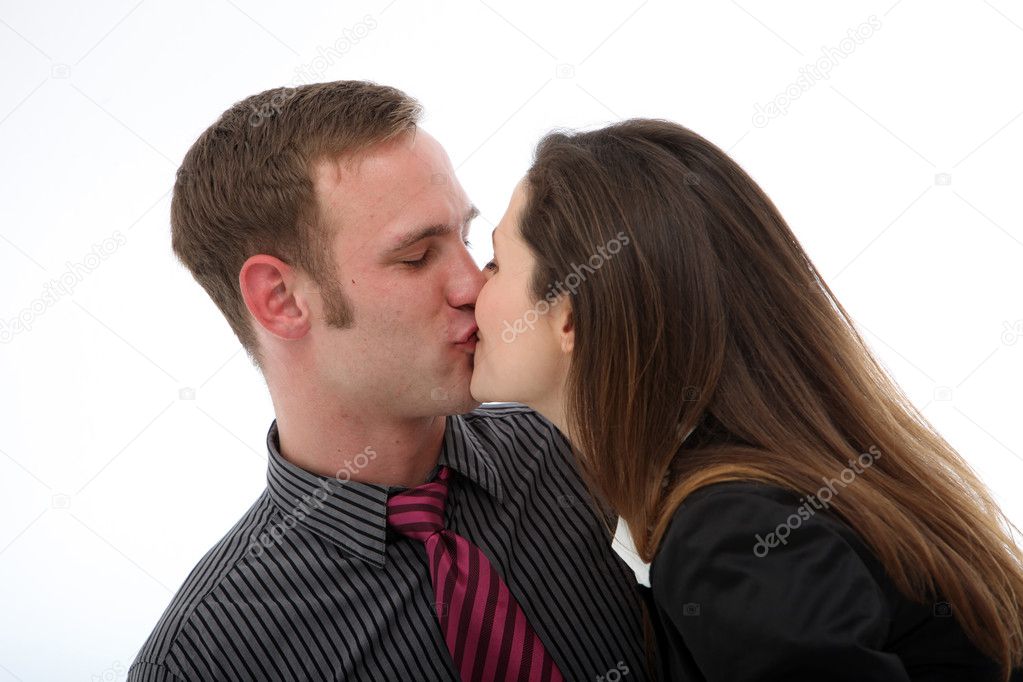 Couple enjoying spontaneous kiss