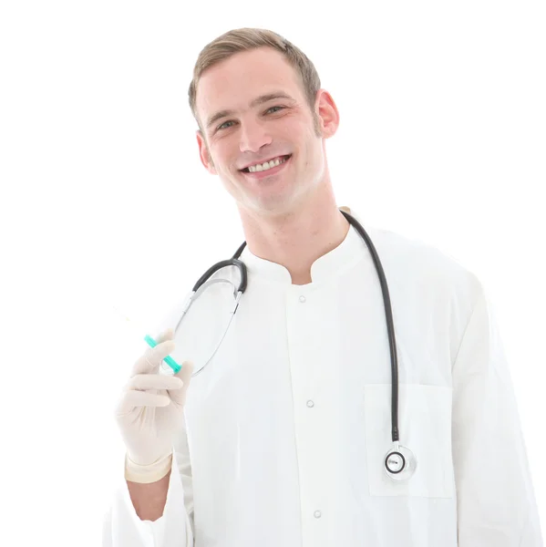 Freudlicher Arzt hält eine Spritze hoch — Stok fotoğraf