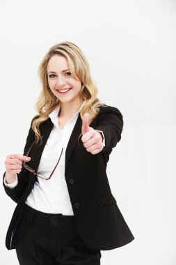 Positive motivated woman giving thumbs up clipart