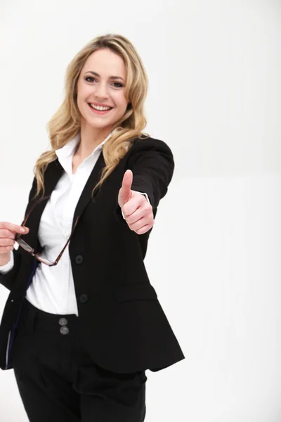 Smiling woman giving thumbs up — Stock Photo, Image