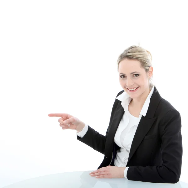 Sonriente mujer profesional señalando — Foto de Stock