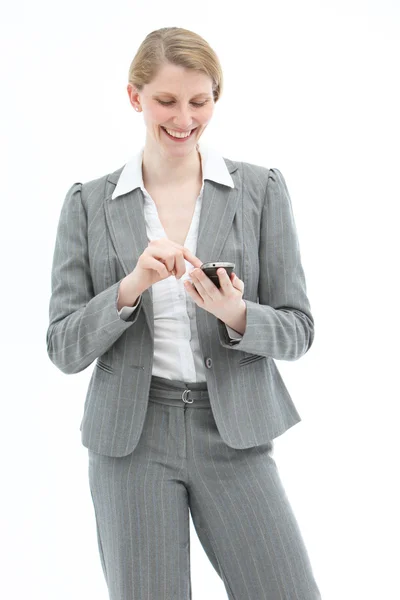 Szczęśliwa kobieta SMS na telefon komórkowy — Zdjęcie stockowe