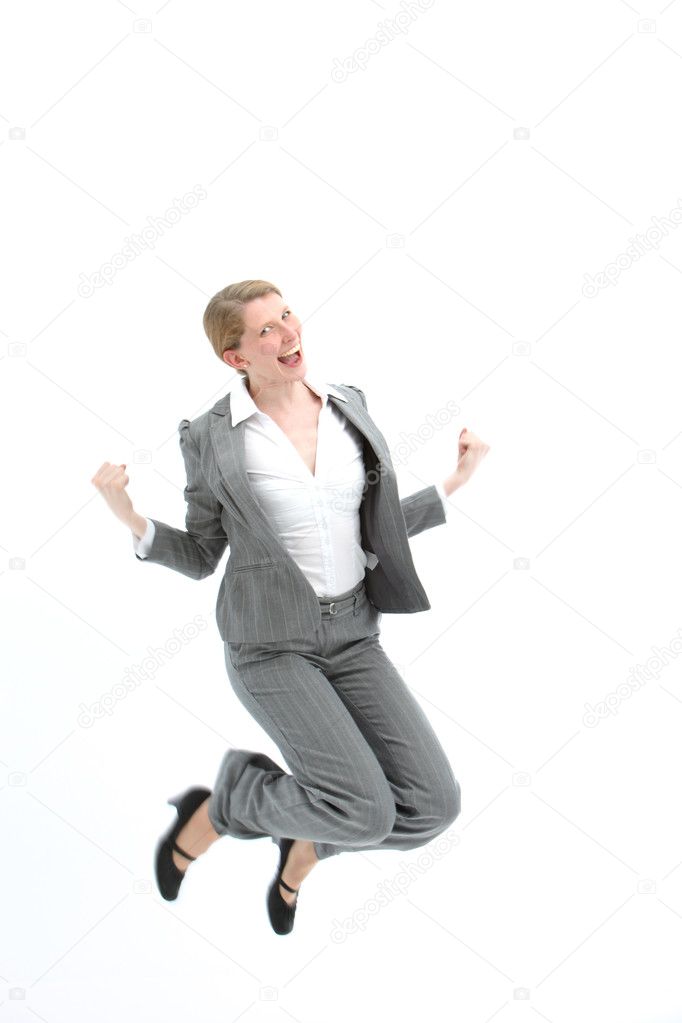 Successful woman jumping for joy