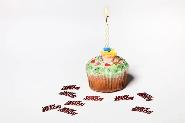 Cupcake com uma vela — Fotografia de Stock