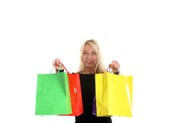 Attrative vrouw bedrijf shopping tassen — Stockfoto