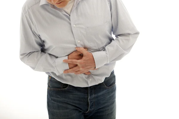 Homem com dores abdominais — Fotografia de Stock