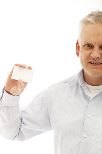 Homem segurando cartão de visita em branco — Fotografia de Stock