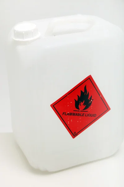 Envase plástico con etiqueta de flammble — Foto de Stock