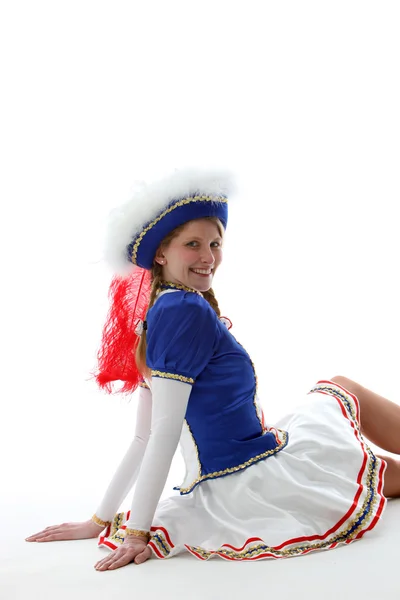 Lachende, junge Frau im GardekostmbH m mit Hut - Freisteller — Foto Stock