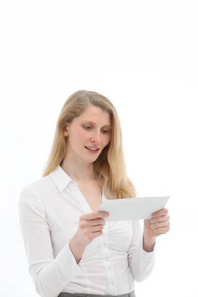 Attractive blonde woman reading letter — Stock Photo, Image