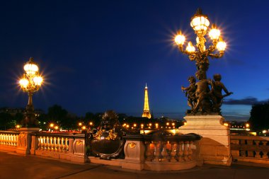 Paris cityscape at night. clipart