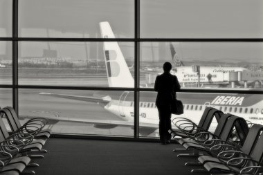 Passenger in airport terminal. clipart