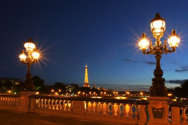 Paris cityscape at night. clipart