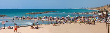 Panoramic view on public beach. clipart