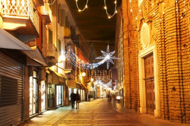 Town center at evening. Alba, Italy. clipart