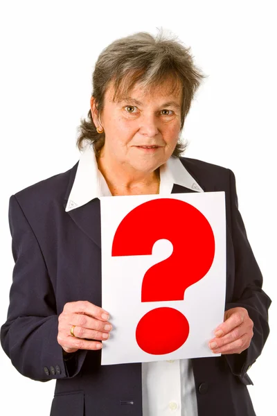 Female senior holding question mark — Stock Photo, Image
