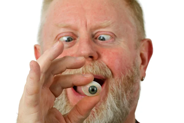 Oculist holding glass eye — Stock Photo, Image