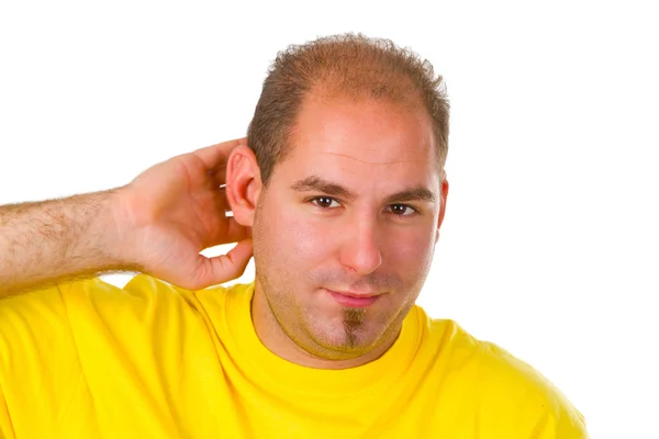 Молодой человек со слабым слухом — стоковое фото