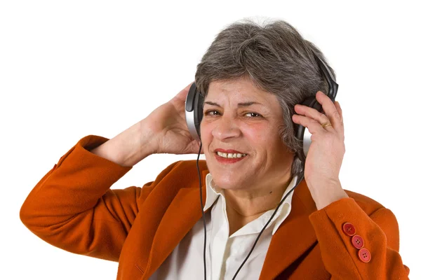 Θηλυκό ανώτερος με ακουστικών — Φωτογραφία Αρχείου