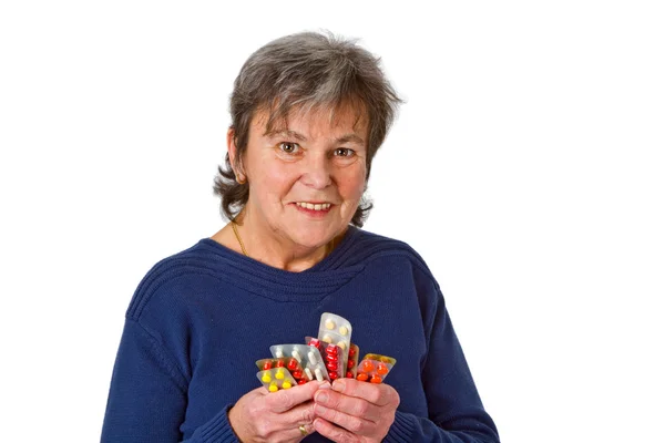 Vrouwelijke senior met pillen — Stockfoto