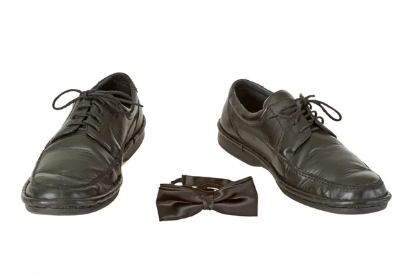 Man's shoe and bow tie — Stock Photo, Image
