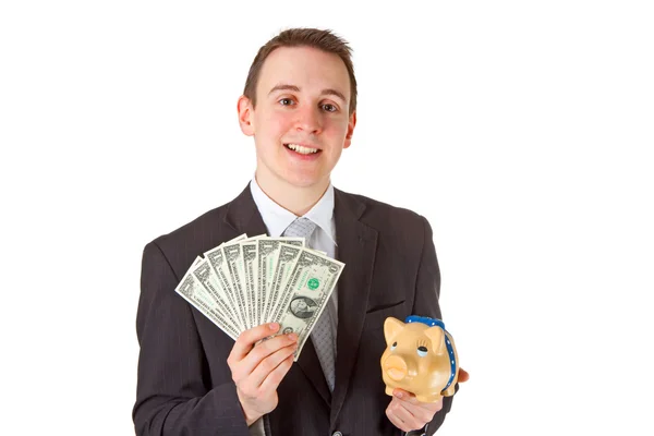 Podnikatel drží dolarové bankovky — Stock fotografie