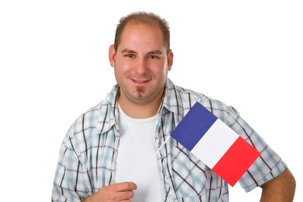 Jeune homme tenant le drapeau français — Photo