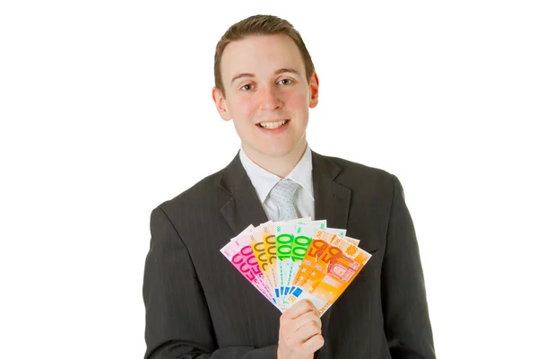 Бізнесмен тримає євро банкноти — стокове фото