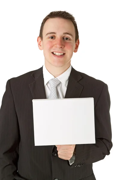 Affärsman som innehar en whiteboard — Stockfoto