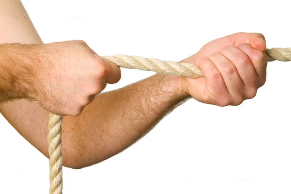 Hände ziehen ein Seil — Stockfoto