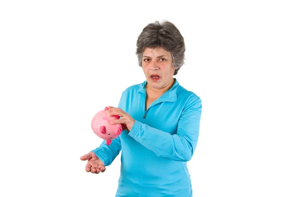 Senior woman with empty piggy bank — Stock Photo, Image