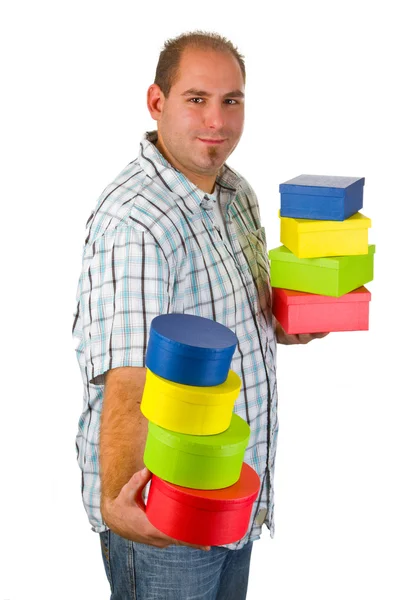 Young man with gift boxes — Stock Photo, Image