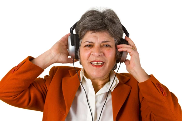Senior femenino con auriculares — Foto de Stock