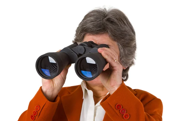 Female senior business woman with binoculars — Stock Photo, Image