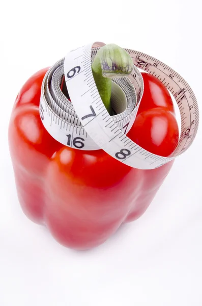 stock image Red bell pepper with measuring tape