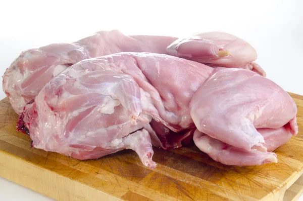 Freshly slaughtered rabbit on a wooden board — Stock Photo, Image