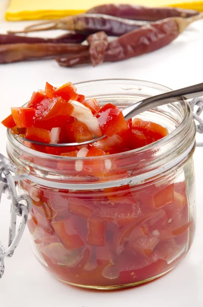 Red bell pepper and tomato relish — Stock Photo, Image