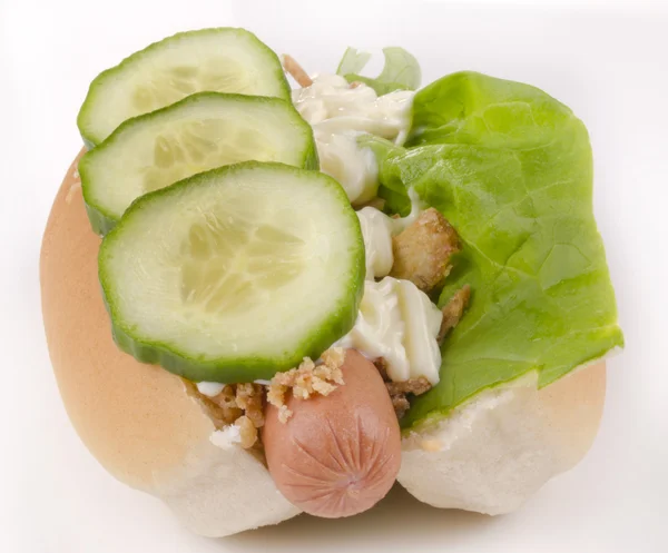Hotdog with cucumber and mayonnaise — Stock Photo, Image