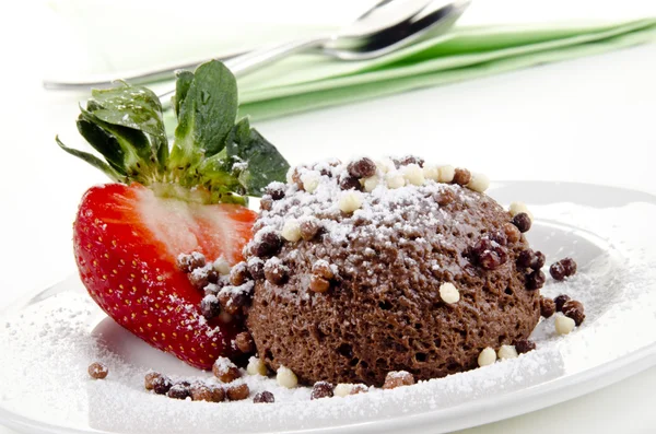 Chocolate mousse and strawberry on a plate — Stock Photo, Image