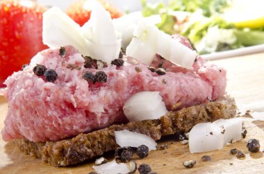Mett with onion and pepper on rye bread clipart