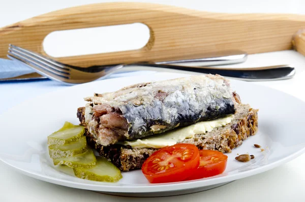 stock image In oil, pickled sardine on a slice of wholemeal bread